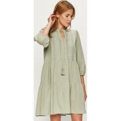 Vero Moda - Sukienka. Czarne sukienki damskie Vero Moda, na co dzień, s, bez wzorów, z bawełny, casualowe, bez kołnierzyka, bez rękawów, mini, rozkloszowane. Za 119,90 zł.