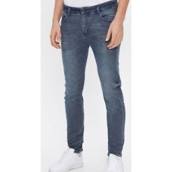 Jeansy skinny z bawełny z recyklingu - Szary. Szare jeansy męskie House, m, bez wzorów. Za 119,99 zł.