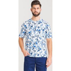 T-SHIRT Armani Exchange. Niebieskie t-shirty męskie Armani Exchange, s, bez wzorów, z bawełny, z okrągłym kołnierzem. Za 160,30 zł.