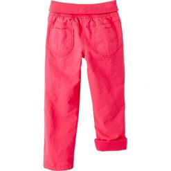 Spodnie w kolorze czerwonym. Czerwone spodnie niemowlęce Vertbaudet Girls & Co., bez wzorów. W wyprzedaży za 45,95 zł.