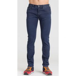 GRANATOWE JEANSY ARMANI EXCHANGE. Niebieskie jeansy męskie Armani Exchange, m, z aplikacjami. Za 299,50 zł.