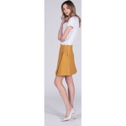 Spódnica z ekoskóry Brave heart musztardowa. Białe spódniczki damskie Veva, na lato, s, bez wzorów, długie, mini, koszulowe. Za 199,00 zł.