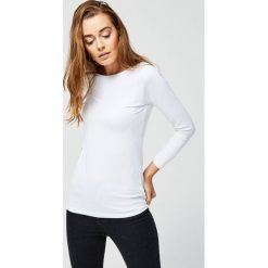 Bluzka typu basic. Bluzki damskie Moodo, s, bez wzorów, bez kołnierzyka, bez rękawów. Za 19,99 zł.