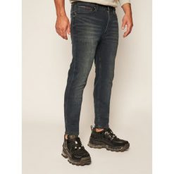 Jeansy Skinny Fit Tommy Jeans Simon DM0DM04423. Niebieskie jeansy męskie Tommy Jeans, m, bez wzorów. Za 449,00 zł.