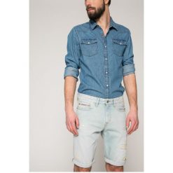 Calvin Klein Jeans - Szorty. Niebieskie spodenki i szorty męskie marki Calvin Klein Jeans, z bawełny, casualowe. W wyprzedaży za 299,90 zł.