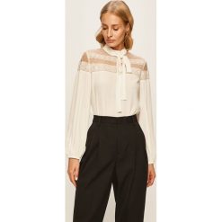 Red Valentino - Bluzka. Białe bluzki damskie Red Valentino, m, bez wzorów, z jedwabiu, ze stójką, z długim rękawem. Za 1899,00 zł.