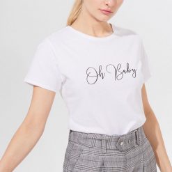 Koszulka z bawełną - Biały. Białe koszulki damskie Mohito, s, bez wzorów, z bawełny, bez kołnierzyka, bez rękawów. Za 39,99 zł.