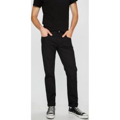 Armani Exchange - Spodnie. Czarne rurki męskie marki Armani Exchange, z elastanu. W wyprzedaży za 269,90 zł.