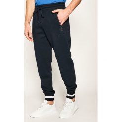Spodnie dresowe MICHAEL Michael Kors Spring 1 CS05JA046F. Niebieskie jeansy męskie MICHAEL Michael Kors, xl, bez wzorów. Za 429,00 zł.
