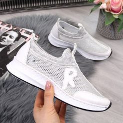 Buty sportowe damskie z siateczką białe Rieker N5654. Białe buty sportowe damskie Rieker, bez wzorów, sportowe. Za 249,99 zł.