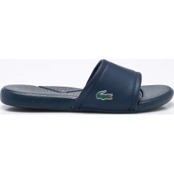 Lacoste - Klapki. Niebieskie klapki damskie Lacoste, bez wzorów, ze skóry, bez obcasa, na obcasie. W wyprzedaży za 89,90 zł.
