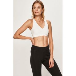 Tommy Sport - Biustonosz sportowy. Niebieskie biustonosze sportowe damskie Tommy Sport, s, bez wzorów, z elastanu. W wyprzedaży za 169,90 zł.