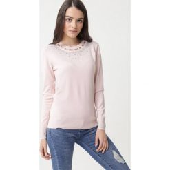 Różowy Sweter Timberglen. Różowe swetry damskie Born2be, xl, z aplikacjami, z dzianiny, eleganckie, bez rękawów, długie, bez kaptura. Za 99,99 zł.