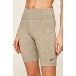 Nike Sportswear - Szorty. Szare spodenki sportowe damskie Nike Sportswear, s, bez wzorów, z elastanu, sportowe, z podwyższonym stanem. Za 119,90 zł.