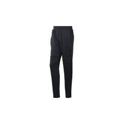 Spodnie Reebok Sport Spodnie dresowe Thermowarm. Czarne spodnie męskie marki Reebok Sport, xl, bez wzorów, z dresówki, sportowe. Za 329,00 zł.