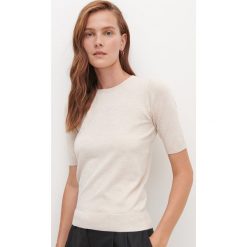 Dzianinowa bluzka -. Bluzki damskie Reserved, s, bez wzorów, z dzianiny, bez kołnierzyka, bez rękawów. Za 49,99 zł.