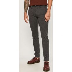 Tom Tailor Denim - Spodnie. Niebieskie spodnie męskie TOM TAILOR DENIM, na co dzień, bez wzorów, z elastanu. Za 259,90 zł.
