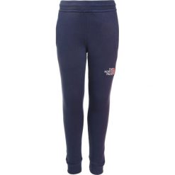The North Face Spodnie treningowe cosmic blue. Niebieskie spodnie chłopięce marki The North Face. Za 199,00 zł.