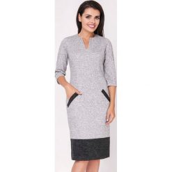 Sukienka w kolorze szarym. Szare sukienki damskie Jesienny butik, xs, bez wzorów, z okrągłym kołnierzem, bez rękawów, midi. W wyprzedaży za 117,95 zł.