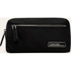 Calvin Klein - Kosmetyczka. Czarne kosmetyczki damskie Calvin Klein, bez wzorów, z nylonu. Za 199,90 zł.