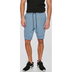 Nike Sportswear - Szorty. Niebieskie spodenki i szorty męskie marki Nike Sportswear, xl, z bawełny, sportowe. W wyprzedaży za 239,90 zł.