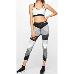 Legginsy do biegania damskie SPDF102 - multikolor 1 allover. Szare legginsy sportowe damskie 4f, bez wzorów, z dzianiny, do biegania. Za 149,99 zł.