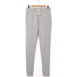 Spodnie dresowe. Szare spodnie dresowe dziewczęce marki La Redoute Collections, z bawełny. Za 52,88 zł.