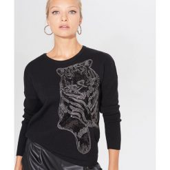 Sweter z cekinowym zdobieniem - Brązowy. Pomarańczowe swetry damskie Mohito, s, z aplikacjami, bez rękawów, bez kaptura. W wyprzedaży za 59,99 zł.