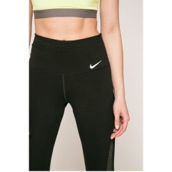 Nike - Legginsy. Czarne legginsy skórzane marki Nike, s. Za 199,90 zł.