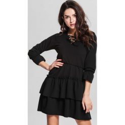 Czarna Sukienka Loner. Czarne sukienki damskie other, na co dzień, s, z aplikacjami, bez kołnierzyka, bez rękawów, mini, rozkloszowane. Za 79,99 zł.