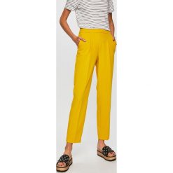 Only - Spodnie. Żółte spodnie damskie ONLY, m, z elastanu. W wyprzedaży za 59,90 zł.