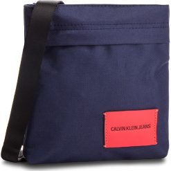 Saszetka CALVIN KLEIN JEANS - Sport Essential Micr K40K400376 448. Niebieskie torby męskie skórzane Calvin Klein Jeans, bez wzorów, z jeansu, młodzieżowe. W wyprzedaży za 219,00 zł.