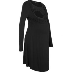 Sukienka kopertowa ciążowa z koronką bonprix czarny. Czarne sukienki koronkowe marki bonprix, w koronkowe wzory, z kopertowym dekoltem, moda ciążowa, kopertowe. Za 109,99 zł.