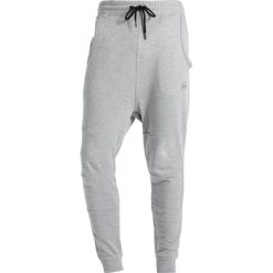 Spodnie dresowe męskie: Jack & Jones JJCOJADE TIGHT FIT Spodnie treningowe light grey melange