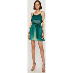 Twinset - Sukienka. Sukienki damskie Twinset, bez wzorów, z poliesteru, bez kołnierzyka, bez rękawów, mini, rozkloszowane. W wyprzedaży za 679,90 zł.