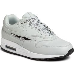 Buty NIKE - Air Max 1 Se 881101 004 Light Silver/Light Silver. Szare buty sportowe damskie Nike, bez wzorów, ze skóry ekologicznej, sportowe, nike air max. Za 619,00 zł.
