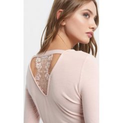 Koszulka z koronką. Brązowe t-shirty damskie Orsay, xs, w koronkowe wzory, z dzianiny, z dekoltem na plecach. Za 39,99 zł.