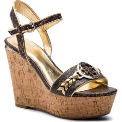 Sandały GUESS - Gesine FL6GSI FAL04 BROWN. Żółte klapki damskie marki Guess, z aplikacjami, ze skóry ekologicznej, bez obcasa, na obcasie. Za 629,00 zł.