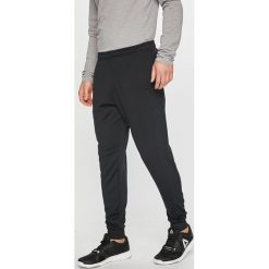Under Armour - Spodnie. Czarne spodnie męskie Under Armour, s, bez wzorów, z poliesteru, sportowe. W wyprzedaży za 219,90 zł.