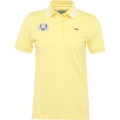 Lacoste Sport RYDER CUP Koszulka sportowa jaune/blanc. Żółte bluzki sportowe damskie Lacoste Sport, z bawełny, polo. Za 369,00 zł.