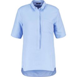 Bluzki asymetryczne: KIOMI Bluzka light blue