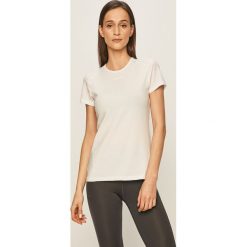 Craft - T-shirt. Różowe topy damskie Craft, s, bez wzorów, z elastanu, z krótkim rękawem. W wyprzedaży za 109,90 zł.