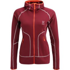 Haglöfs HERON HOOD Kurtka z polaru bigarreau. Czerwone kurtki sportowe damskie marki Haglöfs, xl, z elastanu. W wyprzedaży za 407,20 zł.