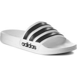 Klapki adidas - adilette Shower AQ1702 Ftwwht/Cblack/Ftwwht. Białe klapki damskie Adidas, bez wzorów, z tworzywa sztucznego, bez obcasa. Za 99,95 zł.