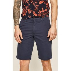 Wrangler - Szorty. Niebieskie spodenki i szorty męskie Wrangler, bez wzorów, z elastanu, casualowe. W wyprzedaży za 169,90 zł.