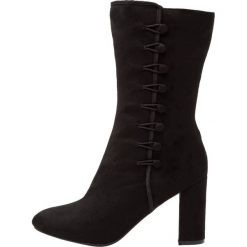Dorothy Perkins Kozaki black. Czarne buty zimowe damskie Dorothy Perkins, z materiału. W wyprzedaży za 207,35 zł.