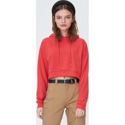Krótka bluza z kapturem - Pomarańczowy. Pomarańczowe bluzy damskie Sinsay, s, bez wzorów, z krótkim rękawem, krótkie, z kapturem. W wyprzedaży za 31,99 zł.