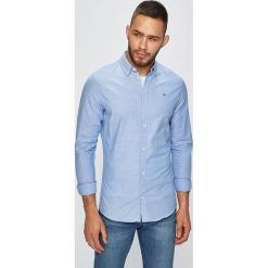 Tommy Jeans - Koszula. Białe koszule męskie Tommy Jeans, xl, bez wzorów, z elastanu, casualowe, button down, z długim rękawem. W wyprzedaży za 239,90 zł.