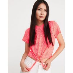 T-shirt z wiązaniem - Pomarańczowy. Pomarańczowe t-shirty damskie Reserved, s, bez wzorów, bez kołnierzyka. W wyprzedaży za 14,99 zł.