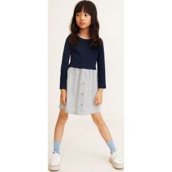 Mango Kids - Sukienka dziecięca Berta 110-152 cm. Niebieskie sukienki dziewczęce Mango Kids, bez wzorów, z bawełny, casualowe, z długim rękawem, długie, mini, rozkloszowane. Za 79,90 zł.
